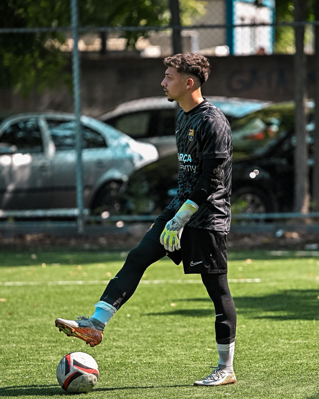 Lucian striking the ball during training